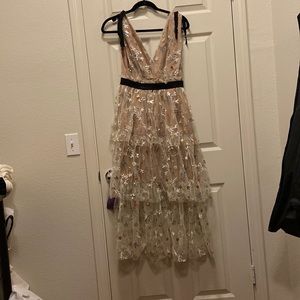 Beautiful self-protrait dress that has never been worn